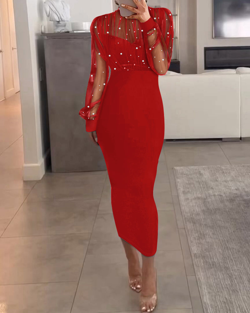 Sukienka imprezowa z prześwitującej siateczki z tyłu i zapięciem na suwak